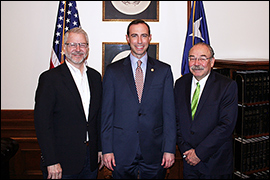 Secretary Whitley with both state party chairs. 