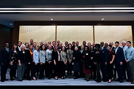 The TBAT committee is seen sitting at a table that surrounds the entire room with nothing in the middle. As a result, everyone is facing each other. 